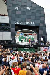 The podium (L to R): Valtteri Bottas (FIN) Mercedes AMG F1, second; Lewis Hamilton (GBR) Mercedes AMG F1, race winner; Charles Leclerc (MON) Ferrari, third. 14.07.2019. Formula 1 World Championship, Rd 10, British Grand Prix, Silverstone, England, Race Day.