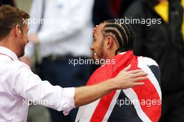 Race winner Lewis Hamilton (GBR) Mercedes AMG F1 celebrates in parc ferme with Jenson Button (GBR) Sky Sports F1 Presenter. 14.07.2019. Formula 1 World Championship, Rd 10, British Grand Prix, Silverstone, England, Race Day.