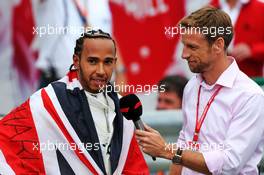 Race winner Lewis Hamilton (GBR) Mercedes AMG F1 in parc ferme with Jenson Button (GBR) Sky Sports F1 Presenter. 14.07.2019. Formula 1 World Championship, Rd 10, British Grand Prix, Silverstone, England, Race Day.