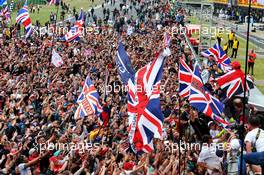 Race winner Lewis Hamilton (GBR) Mercedes AMG F1 celebrates with the fans at the end of the race. 14.07.2019. Formula 1 World Championship, Rd 10, British Grand Prix, Silverstone, England, Race Day.