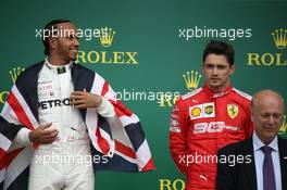 Lewis Hamilton (GBR) Mercedes AMG F1 W10 and Charles Leclerc (MON) Ferrari SF90. 14.07.2019. Formula 1 World Championship, Rd 10, British Grand Prix, Silverstone, England, Race Day.