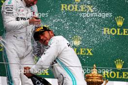 Race winner Lewis Hamilton (GBR) Mercedes AMG F1 celebrates on the podium. 14.07.2019. Formula 1 World Championship, Rd 10, British Grand Prix, Silverstone, England, Race Day.