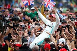 1st place Lewis Hamilton (GBR) Mercedes AMG F1 W10 crowd surfing. 14.07.2019. Formula 1 World Championship, Rd 10, British Grand Prix, Silverstone, England, Race Day.