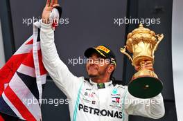 Race winner Lewis Hamilton (GBR) Mercedes AMG F1 celebrates on the podium. 14.07.2019. Formula 1 World Championship, Rd 10, British Grand Prix, Silverstone, England, Race Day.