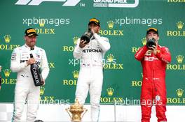 1st place Lewis Hamilton (GBR) Mercedes AMG F1 W10 with Valtteri Bottas (FIN) Mercedes AMG F1 W10 and Charles Leclerc (MON) Ferrari SF90. 14.07.2019. Formula 1 World Championship, Rd 10, British Grand Prix, Silverstone, England, Race Day.