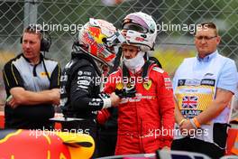 (L to R): Max Verstappen (NLD) Red Bull Racing with Sebastian Vettel (GER) Ferrari in parc ferme. 14.07.2019. Formula 1 World Championship, Rd 10, British Grand Prix, Silverstone, England, Race Day.