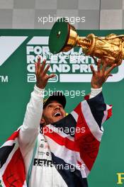 Race winner Lewis Hamilton (GBR) Mercedes AMG F1 celebrates on the podium. 14.07.2019. Formula 1 World Championship, Rd 10, British Grand Prix, Silverstone, England, Race Day.