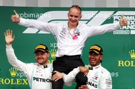 Race winner Lewis Hamilton (GBR) Mercedes AMG F1 and second placed Valtteri Bottas (FIN) Mercedes AMG F1 celebrate on the podium. 14.07.2019. Formula 1 World Championship, Rd 10, British Grand Prix, Silverstone, England, Race Day.