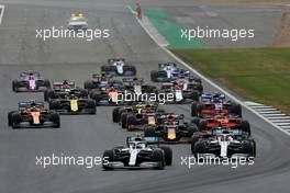 Start of the race, Valtteri Bottas (FIN), Mercedes AMG F1 and Lewis Hamilton (GBR), Mercedes AMG F1   14.07.2019. Formula 1 World Championship, Rd 10, British Grand Prix, Silverstone, England, Race Day.