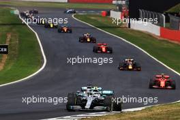 Valtteri Bottas (FIN) Mercedes AMG F1 W10 leads at the start of the race. 14.07.2019. Formula 1 World Championship, Rd 10, British Grand Prix, Silverstone, England, Race Day.