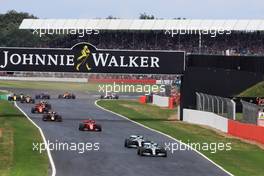 Valtteri Bottas (FIN) Mercedes AMG F1 W10 leads at the start of the race. 14.07.2019. Formula 1 World Championship, Rd 10, British Grand Prix, Silverstone, England, Race Day.