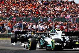Lewis Hamilton (GBR) Mercedes AMG F1 W10 leads team mate Valtteri Bottas (FIN) Mercedes AMG F1 W10. 14.07.2019. Formula 1 World Championship, Rd 10, British Grand Prix, Silverstone, England, Race Day.