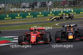 Charles Leclerc (MON) Ferrari SF90 and Max Verstappen (NLD) Red Bull Racing RB15. 14.07.2019. Formula 1 World Championship, Rd 10, British Grand Prix, Silverstone, England, Race Day.