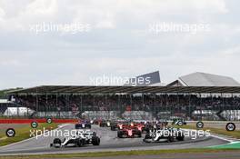 Valtteri Bottas (FIN) Mercedes AMG F1 W10 leads at the start of the race. 14.07.2019. Formula 1 World Championship, Rd 10, British Grand Prix, Silverstone, England, Race Day.