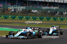 George Russell (GBR) Williams Racing FW42 leads Robert Kubica (POL) Williams Racing FW42. 14.07.2019. Formula 1 World Championship, Rd 10, British Grand Prix, Silverstone, England, Race Day.