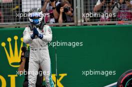 Valtteri Bottas (FIN) Mercedes AMG F1 W10 celebrates his pole position in qualifying parc ferme. 13.07.2019. Formula 1 World Championship, Rd 10, British Grand Prix, Silverstone, England, Qualifying Day.