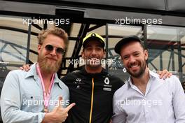 Daniel Ricciardo (AUS) Renault F1 Team (Centre) with Ted Dwane (GBR) (Left) and Ben Lovett (GBR) (Right) Mumford & Sons Musicians. 14.07.2019. Formula 1 World Championship, Rd 10, British Grand Prix, Silverstone, England, Race Day.