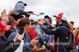 Pierre Gasly (FRA) Red Bull Racing signs autographs for the fans. 14.07.2019. Formula 1 World Championship, Rd 10, British Grand Prix, Silverstone, England, Race Day.