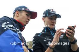 (L to R): Alexander Albon (THA) Scuderia Toro Rosso and George Russell (GBR) Williams Racing on the drivers parade. 14.07.2019. Formula 1 World Championship, Rd 10, British Grand Prix, Silverstone, England, Race Day.