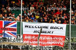 Robert Kubica (POL) Williams Racing banner with fans in the grandstand. 14.07.2019. Formula 1 World Championship, Rd 10, British Grand Prix, Silverstone, England, Race Day.