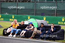 (L to R): Kevin Magnussen (DEN) Haas F1 Team with Karun Chandhok (IND) Sky Sports F1 Pitlane Reporter and Anthony Davidson (GBR). 11.07.2019. Formula 1 World Championship, Rd 10, British Grand Prix, Silverstone, England, Preparation Day.