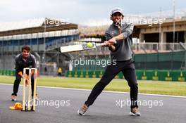 Carlos Sainz Jr (ESP) McLaren plays cricket. 11.07.2019. Formula 1 World Championship, Rd 10, British Grand Prix, Silverstone, England, Preparation Day.