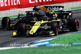 Nico Hulkenberg (GER) Renault F1 Team RS19 and Romain Grosjean (FRA) Haas F1 Team VF-19. 26.07.2019. Formula 1 World Championship, Rd 11, German Grand Prix, Hockenheim, Germany, Practice Day.