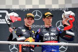The podium (L to R): Race winner Max Verstappen (NLD) Red Bull Racing celebrates with third placed Daniil Kvyat (RUS) Scuderia Toro Rosso. 28.07.2019. Formula 1 World Championship, Rd 11, German Grand Prix, Hockenheim, Germany, Race Day.