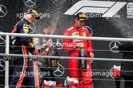 Race winner Max Verstappen (NLD) Red Bull Racing celebrates on the podium with Sebastian Vettel (GER) Ferrari. 28.07.2019. Formula 1 World Championship, Rd 11, German Grand Prix, Hockenheim, Germany, Race Day.