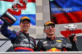 (L to R): Daniil Kvyat (RUS) Scuderia Toro Rosso celebrates his third position on the podium with race winner Max Verstappen (NLD) Red Bull Racing. 28.07.2019. Formula 1 World Championship, Rd 11, German Grand Prix, Hockenheim, Germany, Race Day.
