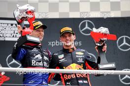 The podium (L to R): Daniil Kvyat (RUS) Scuderia Toro Rosso celebrates his third position with race winner Max Verstappen (NLD) Red Bull Racing. 28.07.2019. Formula 1 World Championship, Rd 11, German Grand Prix, Hockenheim, Germany, Race Day.