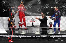 Race winner Max Verstappen (NLD) Red Bull Racing celebrates on the podium with Sebastian Vettel (GER) Ferrari and Daniil Kvyat (RUS) Scuderia Toro Rosso. 28.07.2019. Formula 1 World Championship, Rd 11, German Grand Prix, Hockenheim, Germany, Race Day.