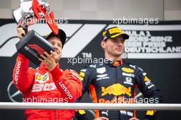 Sebastian Vettel (GER) Ferrari celebrates his second position on the podium. 28.07.2019. Formula 1 World Championship, Rd 11, German Grand Prix, Hockenheim, Germany, Race Day.