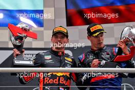 (L to R): Race winner Max Verstappen (NLD) Red Bull Racing and Daniil Kvyat (RUS) Scuderia Toro Rosso celebrate on the podium. 28.07.2019. Formula 1 World Championship, Rd 11, German Grand Prix, Hockenheim, Germany, Race Day.