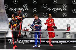 Race winner Max Verstappen (NLD) Red Bull Racing celebrates on the podium with Sebastian Vettel (GER) Ferrari and Daniil Kvyat (RUS) Scuderia Toro Rosso. 28.07.2019. Formula 1 World Championship, Rd 11, German Grand Prix, Hockenheim, Germany, Race Day.