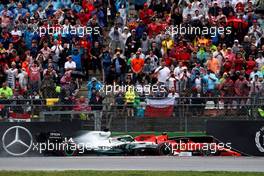 Lewis Hamilton (GBR) Mercedes AMG F1 W10 runs wide and crashes into the barrier, narrowly missing the Ferrari SF90 of Charles Leclerc (MON). 28.07.2019. Formula 1 World Championship, Rd 11, German Grand Prix, Hockenheim, Germany, Race Day.