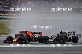 (L to R): Max Verstappen (NLD) Red Bull Racing RB15 and Kevin Magnussen (DEN) Haas VF-19 battle for position. 28.07.2019. Formula 1 World Championship, Rd 11, German Grand Prix, Hockenheim, Germany, Race Day.