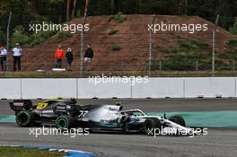 Valtteri Bottas (FIN) Mercedes AMG F1 W10 and Nico Hulkenberg (GER) Renault F1 Team RS19 battle for position. 28.07.2019. Formula 1 World Championship, Rd 11, German Grand Prix, Hockenheim, Germany, Race Day.