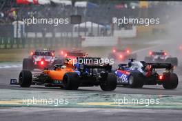 Lando Norris (GBR) McLaren MCL34 and Daniil Kvyat (RUS) Scuderia Toro Rosso STR14. 28.07.2019. Formula 1 World Championship, Rd 11, German Grand Prix, Hockenheim, Germany, Race Day.