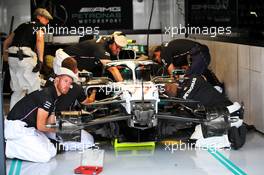 Mercedes AMG F1 W10 of Lewis Hamilton (GBR) Mercedes AMG F1 worked on by mechanics in vintage clothing. 27.07.2019. Formula 1 World Championship, Rd 11, German Grand Prix, Hockenheim, Germany, Qualifying Day.