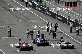 Qualifying top three in parc ferme (L to R): Max Verstappen (NLD) Red Bull Racing, second; Lewis Hamilton (GBR) Mercedes AMG F1, pole position; Valtteri Bottas (FIN) Mercedes AMG F1, third. 27.07.2019. Formula 1 World Championship, Rd 11, German Grand Prix, Hockenheim, Germany, Qualifying Day.