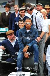 Lewis Hamilton (GBR) Mercedes AMG F1, Toto Wolff (GER) Mercedes AMG F1 Shareholder and Executive Director, and the team wear vintage clothing to celebrate 125 years in motorsport. 28.07.2019. Formula 1 World Championship, Rd 11, German Grand Prix, Hockenheim, Germany, Race Day.