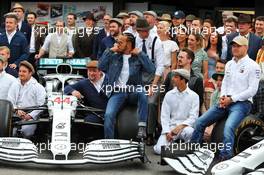 Lewis Hamilton (GBR) Mercedes AMG F1, Toto Wolff (GER) Mercedes AMG F1 Shareholder and Executive Director, Valtteri Bottas (FIN) Mercedes AMG F1, and the team wear vintage clothing to celebrate 125 years in motorsport. 28.07.2019. Formula 1 World Championship, Rd 11, German Grand Prix, Hockenheim, Germany, Race Day.