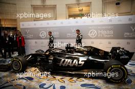 Kevin Magnussen (DEN) Haas F1 Team and Romain Grosjean (FRA) Haas F1 Team unveil the new livery on the Haas VF-18. 27.02.2019. Haas F1 Team Livery Unveil, The Royal Automobile Club, London, England.