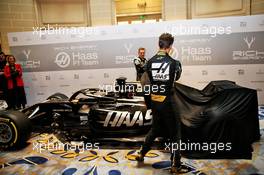 Romain Grosjean (FRA) Haas F1 Team and Kevin Magnussen (DEN) Haas F1 Team unveil the new livery on the Haas VF-18. 27.02.2019. Haas F1 Team Livery Unveil, The Royal Automobile Club, London, England.