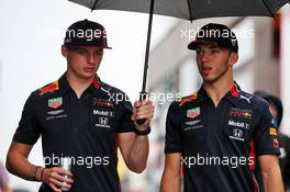 (L to R): Max Verstappen (NLD) Red Bull Racing with team mate Pierre Gasly (FRA) Red Bull Racing. 02.08.2019. Formula 1 World Championship, Rd 12, Hungarian Grand Prix, Budapest, Hungary, Practice Day.