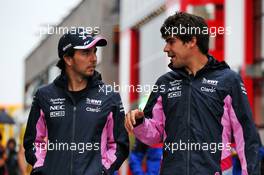 (L to R): Sergio Perez (MEX) Racing Point F1 Team with team mate Lance Stroll (CDN) Racing Point F1 Team. 02.08.2019. Formula 1 World Championship, Rd 12, Hungarian Grand Prix, Budapest, Hungary, Practice Day.