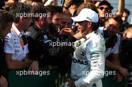 Race winner Lewis Hamilton (GBR) Mercedes AMG F1 celebrates with the team in parc ferme. 04.08.2019. Formula 1 World Championship, Rd 12, Hungarian Grand Prix, Budapest, Hungary, Race Day.