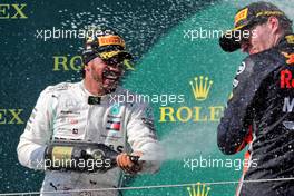 Race winner Lewis Hamilton (GBR) Mercedes AMG F1 celebrates on the podium with Max Verstappen (NLD) Red Bull Racing. 04.08.2019. Formula 1 World Championship, Rd 12, Hungarian Grand Prix, Budapest, Hungary, Race Day.