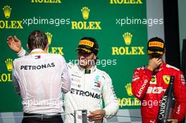 Race winner Lewis Hamilton (GBR) Mercedes AMG F1 celebrates on the podium with James Vowles (GBR) Mercedes AMG F1 Chief Strategist and Sebastian Vettel (GER) Ferrari. 04.08.2019. Formula 1 World Championship, Rd 12, Hungarian Grand Prix, Budapest, Hungary, Race Day.